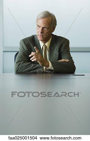 gesture, pointing, arms folded, businessman, leader, furrowing brow View Large Photo Image Picture - gesture, pointing, arms folded, businessman, leader, furrowing brow. Fotosearch