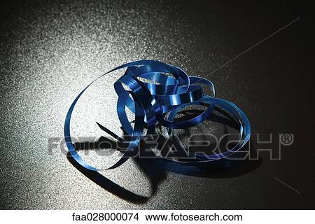 Gift-wrap ribbon, close-up View Large Photo Image Picture - Gift-wrap ribbon, close-up. Fotosearch