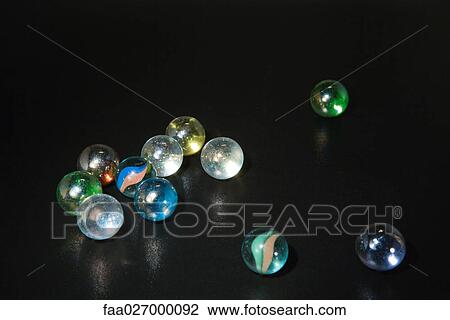 Glass marbles, close-up View Large Photo Image Stock Image - Glass marbles, close-up. Fotosearch