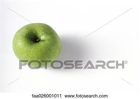 Granny smith apple with water droplets, viewed from directly above View Large Photo Image Stock Image - Granny smith apple with water droplets, viewed from directly above. Fotosearch