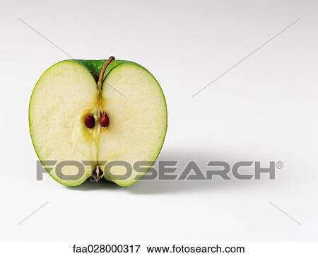 Green apple, cross section, close-up View Large Photo Image Stock Photo - Green apple, cross section, close-up. Fotosearch