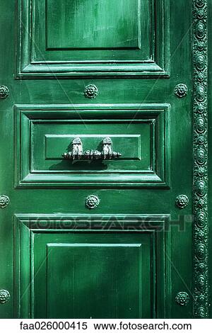 Green door with ornate handle, full frame View Large Photo Image Stock Photography - Green door with ornate handle, full frame. Fotosearch