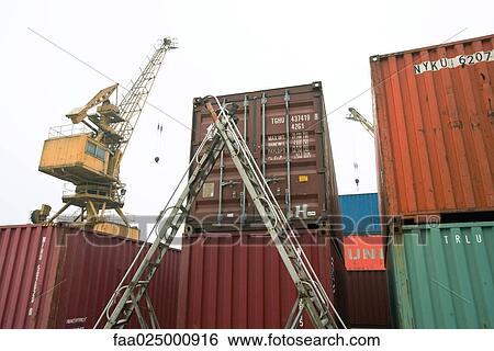 Ladder next to cargo containers View Large Photo Image Stock Photograph - Ladder next to cargo containers. Fotosearch