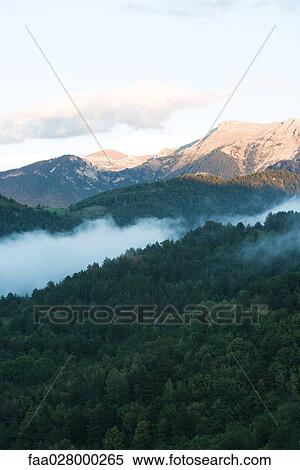 Landscape with mountains and fog View Large Photo Image Stock Photography - Landscape with mountains and fog. Fotosearch