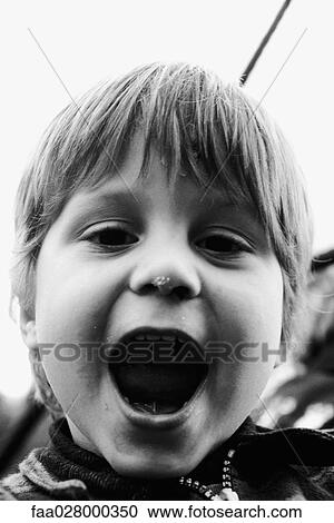 Little boy looking at camera, mouth open wide, portrait View Large Photo Image Stock Image - Little boy looking at camera, mouth open wide, portrait. Fotosearch