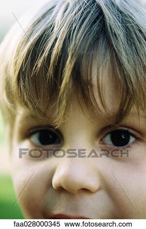 Little boy looking at camera, portrait, cropped View Large Photo Image Stock Photography - Little boy looking at camera, portrait, cropped. Fotosearch