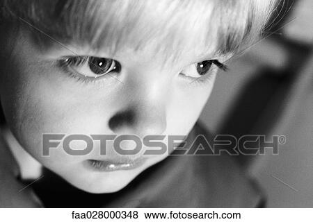 Little boy looking away, close-up, portrait, high angle view View Large Photo Image Stock Photo - Little boy looking away, close-up, portrait, high angle view. Fotosearch