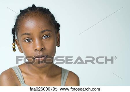 Little girl, looking at camera, head and shoulders, portrait View Large Photo Image Stock Photography - Little girl, looking at camera, head and shoulders, portrait. Fotosearch