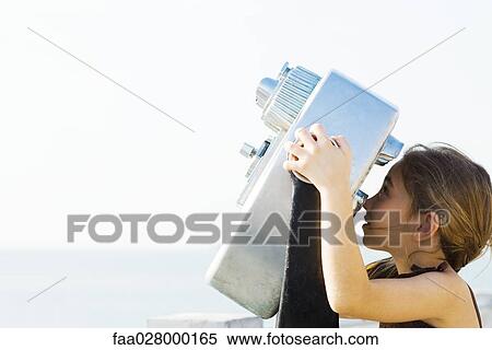 Little girl looking through coin-operated binoculars, side view View Large Photo Image Stock Photography - Little girl looking through coin-operated binoculars, side view. Fotosearch