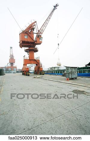 Loading crane in shipyard View Large Photo Image Stock Image - Loading crane in shipyard. Fotosearch