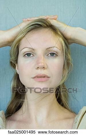 looking at camera, close-up, portrait, woman, young women, hand on head, beauty View Large Photo Image Stock Photography - looking at camera, close-up, portrait, woman, young women, hand on head, beauty. Fotosearch