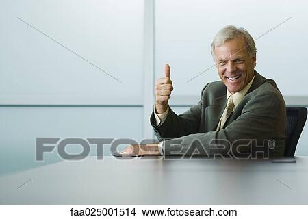 looking at camera, gesture, smiling, leaning against, businessman, thumbs up View Large Photo Image Picture - looking at camera, gesture, smiling, leaning against, businessman, thumbs up. Fotosearch