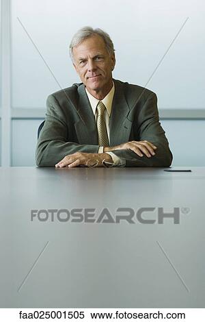 looking at camera, portrait, smiling, arms folded, businessman, ceo View Large Photo Image Stock Photography - looking at camera, portrait, smiling, arms folded, businessman, ceo. Fotosearch