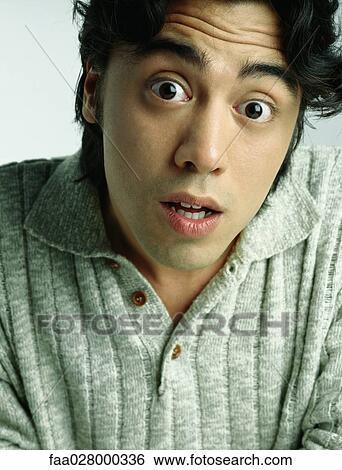 Man looking at camera with wide eyes, raising eyebrows, portrait View Large Photo Image Stock Photograph - Man looking at camera with wide eyes, raising eyebrows, portrait. Fotosearch