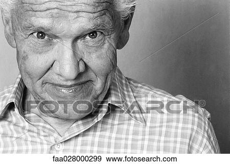 Man smiling at camera, portrait, cropped View Large Photo Image Stock Photo - Man smiling at camera, portrait, cropped. Fotosearch