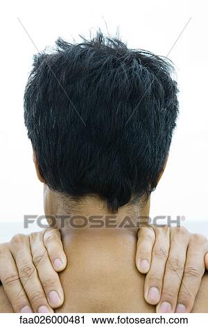 Man with hands on shoulders, cropped rear view View Large Photo Image Stock Image - Man with hands on shoulders, cropped rear view. Fotosearch