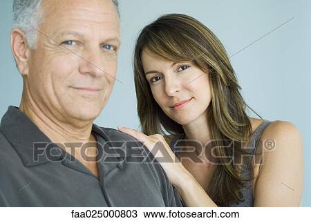 Mature father and adult daughter smiling at camera, portrait View Large Photo Image Stock Image - Mature father and adult daughter smiling at camera, portrait. Fotosearch