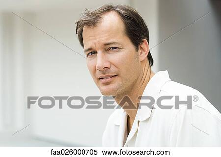 Mature man, looking at camera, portrait View Large Photo Image Stock Photography - Mature man, looking at camera, portrait. Fotosearch
