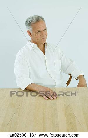 Mature man smiling, looking away, portrait View Large Photo Image Stock Photo - Mature man smiling, looking away, portrait. Fotosearch