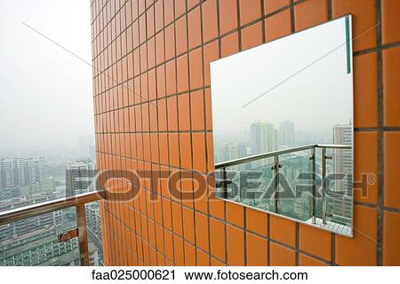 Mirror on outer wall reflecting cityscape View Large Photo Image Stock Image - Mirror on outer wall reflecting cityscape. Fotosearch