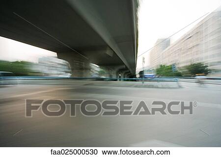 Overpass viewed from freeway, blurred motion View Large Photo Image Stock Image - Overpass viewed from freeway, blurred motion. Fotosearch