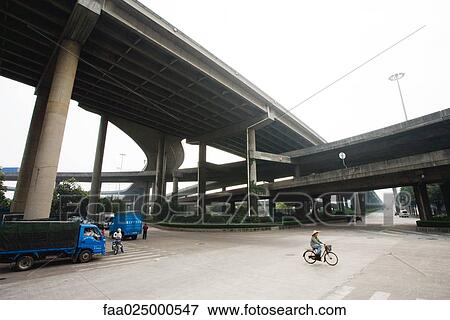 Stock Photo - Overpasses and cyclist. Fotosearch
