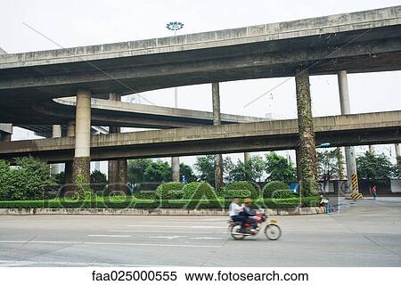 Overpasses, motorbike in foreground, blurred motion View Large Photo Image Stock Photography - Overpasses, motorbike in foreground, blurred motion. Fotosearch