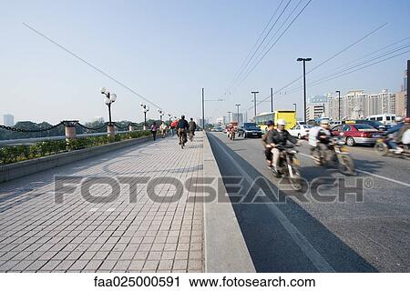 Pedestrian lane next to city thoroughfare, China View Large Photo Image Stock Image - Pedestrian lane next to city thoroughfare, China. Fotosearch