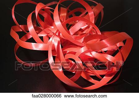 Red gift-wrap ribbon, close-up View Large Photo Image Stock Photograph - Red gift-wrap ribbon, close-up. Fotosearch