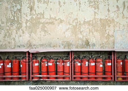 Row of fire extinguishers View Large Photo Image Stock Photo - Row of fire extinguishers. Fotosearch
