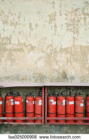 Row of fire extinguishers View Large Photo Image Stock Photo - Row of fire extinguishers. Fotosearch
