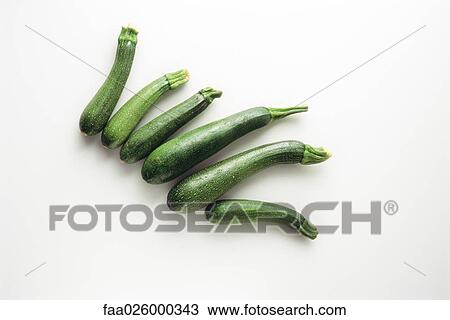 Several zucchinis, high angle view View Large Photo Image Stock Image - Several zucchinis, high angle view. Fotosearch