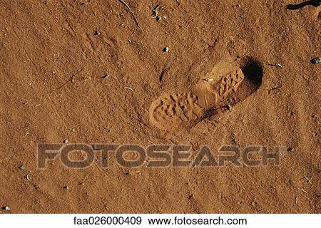 Shoeprint in sand, high angle view, close-up View Large Photo Image Stock Photo - Shoeprint in sand, high angle view, close-up. Fotosearch