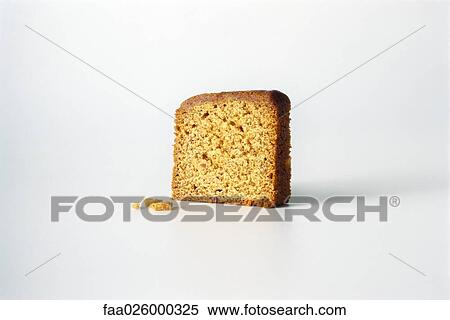 Slice of bread and crumbs, white background View Large Photo Image Stock Photography - Slice of bread and crumbs, white background. Fotosearch