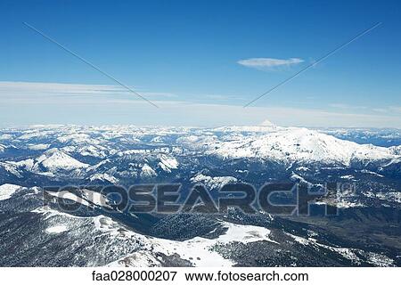 Stock Photo - Snow-capped mountain range. Fotosearch