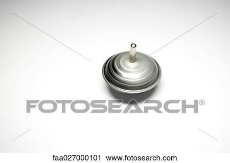 Spinning top, close-up View Large Photo Image Stock Image - Spinning top, close-up. Fotosearch