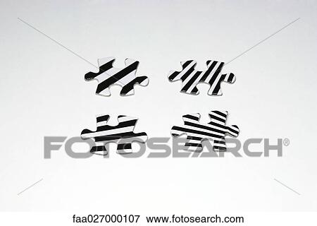 Striped puzzle pieces, close-up View Large Photo Image Stock Photo - Striped puzzle pieces, close-up. Fotosearch