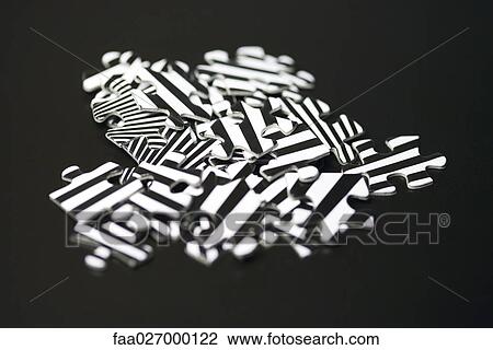 Striped puzzle pieces in a pile, close-up View Large Photo Image Stock Image - Striped puzzle pieces in a pile, close-up. Fotosearch