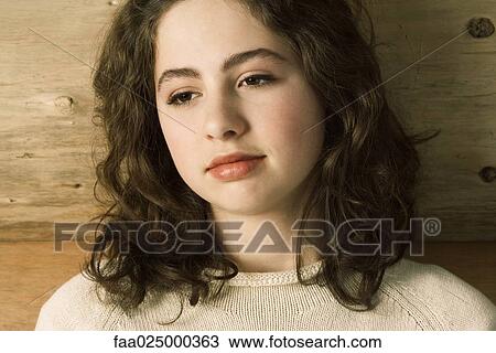 Teen girl, looking away, portrait View Large Photo Image Stock Image - Teen girl, looking away, portrait. Fotosearch
