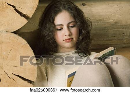 Teen girl reading View Large Photo Image Stock Photo - Teen girl reading. Fotosearch