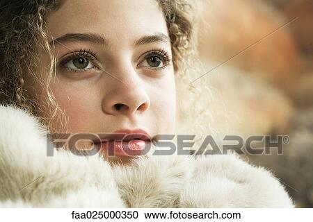 Teen girl under soft blanket, close-up View Large Photo Image Stock Image - Teen girl under soft blanket, close-up. Fotosearch