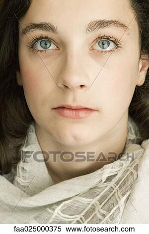 Stock Photography - Teen girl with shawl around shoulders, portrait. Fotosearch