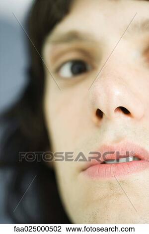 Teenage boy looking at camera, close-up, cropped view View Large Photo Image Stock Image - Teenage boy looking at camera, close-up, cropped view. Fotosearch