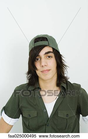 Teenage boy wearing cap, portrait View Large Photo Image Stock Photography - Teenage boy wearing cap, portrait. Fotosearch