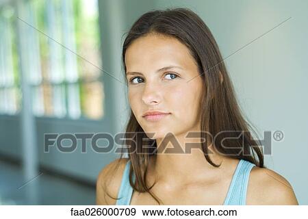 Teenage girl, looking to the side, portrait View Large Photo Image Stock Photo - Teenage girl, looking to the side, portrait. Fotosearch