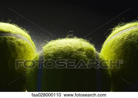 Tennis balls, extreme close-up View Large Photo Image Stock Image - Tennis balls, extreme close-up. Fotosearch