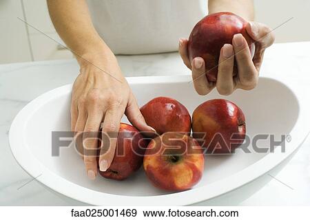 touching, hand, fruit, apple, holding, picking up, fruit bowl View Large Photo Image Stock Photo - touching, hand, fruit, apple, holding, picking up, fruit bowl. Fotosearch