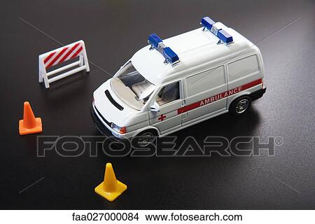 Toy ambulance and traffic cones, close-up View Large Photo Image Picture - Toy ambulance and traffic cones, close-up. Fotosearch