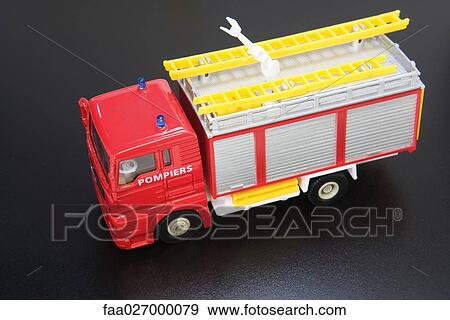 Toy fire engine, close-up View Large Photo Image Stock Photo - Toy fire engine, close-up. Fotosearch