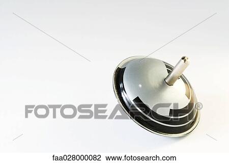 Toy top, close-up View Large Photo Image Stock Image - Toy top, close-up. Fotosearch